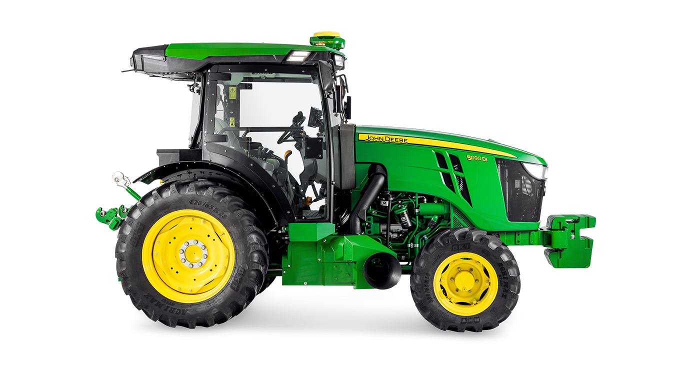 Bočni profil traktora John Deere 5090EN, naglašavajući dizajn kabine i velike stražnje gume.